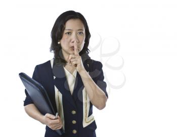 Asian women carrying folder and pen in business suit on white background