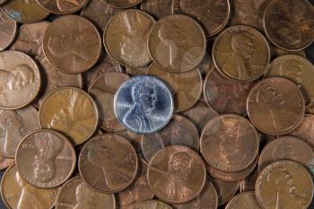 White Steel Cent in pile of United States Cents