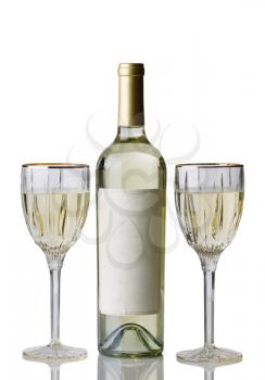 Vertical image of an unopened bottle of white wine, with drinking glasses, isolated over white background with reflection