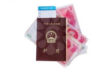 China passport and boarding pass with paper currency underneath isolated on white background. 