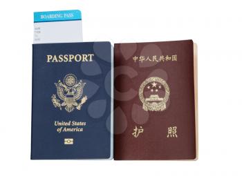 United States and China passport and boarding pass isolated on white background. 