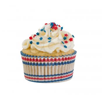 Close up image of Fourth of July decorated small cupcake, in wrapper, isolated on white.