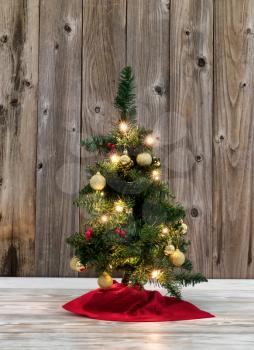 Christmas Tree decoration on rustic wooden background 