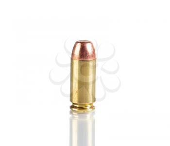 Single bullet isolated on white background with reflection 