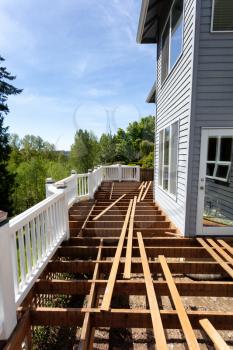 Aged outdoor wooden cedar deck tear down 