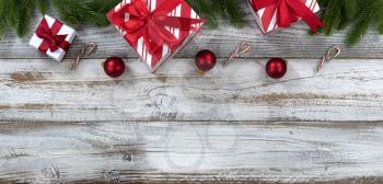 Merry Christmas holiday top border on white weathered wooden background for the season  