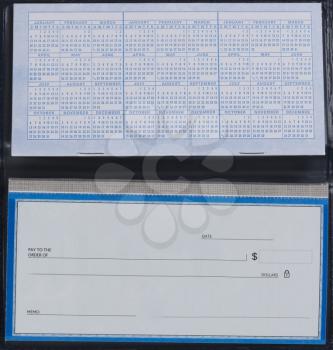 Blank check and calendar for Finance