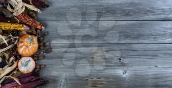 Seasonal autumn decorations in full colors on weathered wood for Thanksgiving or Halloween holiday concept