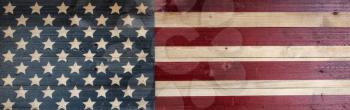 Fading vintage wooden US flag background for holiday concepts 