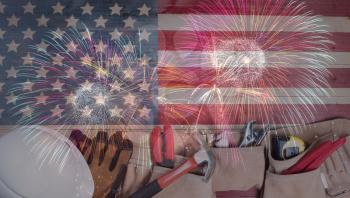 Labor Day background with hand tools and fireworks for the holiday celebration 