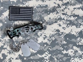 US flag, military knife and ID tags for Memorial, 4th of July and Labor Day holiday 