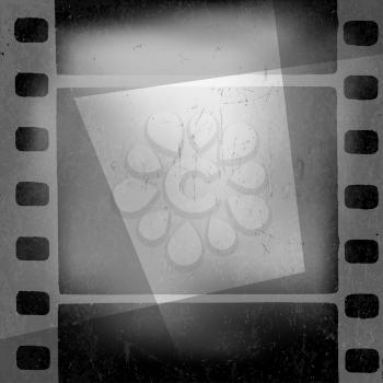 Grunge monochrome filmstrip with space for text . Film noir, old cinema background design template