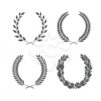 Different black and white silhouette circular wreaths depicting an award, achievement, heraldry, nobility. 