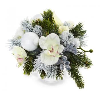 Christmas arrangement of Christmas balls, orchids, snowflakes, beads and pine branches isolated on white background