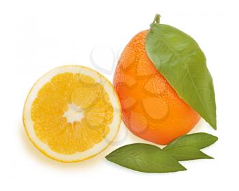 fresh ripe orange fruits with cut and green leaves isolated on white background