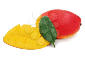 Fresh mango fruit with cut and green leaves isolated on white background.