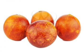 Ripe red blood oranges isolated on white background.