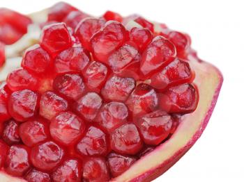 Pomegranate fruits isolated on white background. Close-up.