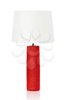 Red table lamp isolated on a white background. Clodeup.