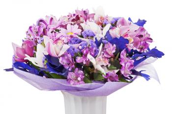 Bouquet from orchids and lilies in vase isolated on white background. Closeup.
