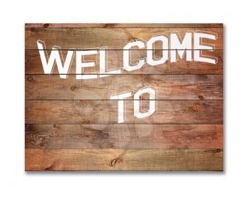 Vintage WELCOME sign on natural wooden surface isolated on white background. Closeup.