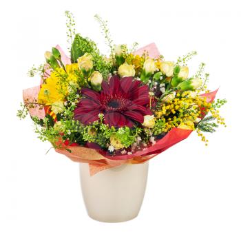 Beautiful bouquet of gerbera, carnations and other flowers in red  package and vase isolated on white background.
