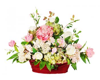 Colorful floral bouquet from roses and cloves arrangement centerpiece in vase isolated on white background