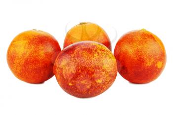 Ripe red blood oranges isolated on white background. Closeup.