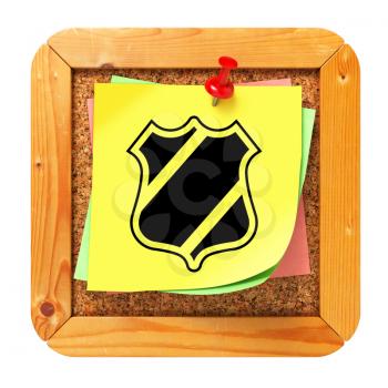 Security Concept with Shield Icon on Yellow Sticker on Cork Message Board.