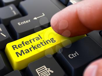 Referral Marketing Concept. Person Click on Yellow Keyboard Button. Selective Focus. Closeup View.