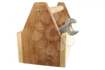 Wooden tool box with a wrench isolated on a white background