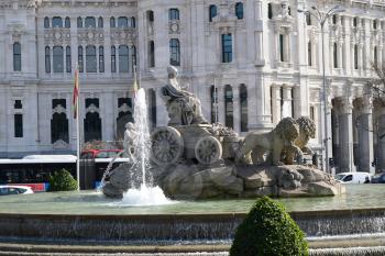 MADRID-SPAIN-FEB 19, 2019:The Plaza de Cibeles is a square with a neo-classical complex of marble sculptures with fountains that has become an iconic symbol for the city of Madrid.