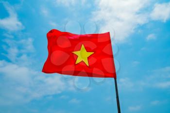 Flag of Vietnam on blue sky background