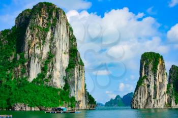 Rock islands near floating village in Halong Bay, Vietnam, Southeast Asia