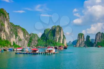 Floating fishing village in Halong Bay, Vietnam, Southeast Asia. UNESCO World Heritage Site.