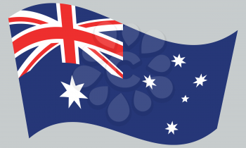 Flag of Australia waving on gray background. Australian national flag.
