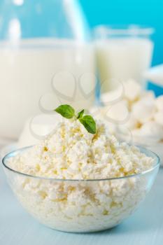 Cottage cheese in a transparent  bowl with oregano