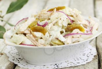 Salad with fresh cabbage, chicken breast and cucumber