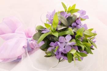 small wedding bouquet of violets and forget-me-not
