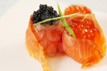 Smoked salmon stuffed with red and black caviar