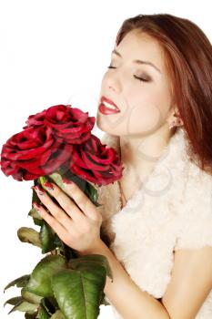 Woman with a bouquet of roses on a white background