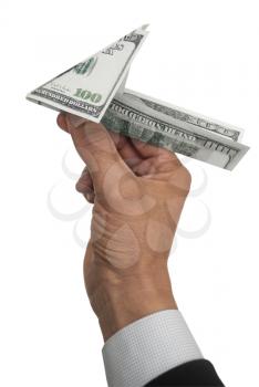 Royalty Free Photo of a Person Holding a Money Plane
