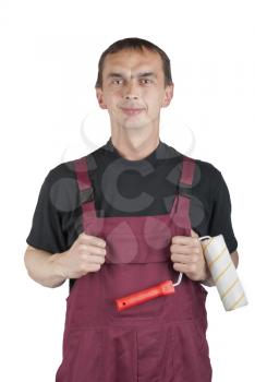 Royalty Free Photo of a House Painter With a Roller