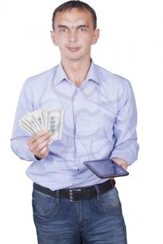 Man with tablet and dollars in hands.