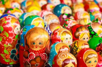 Colorful Russian nesting dolls matreshka at the market. Matrioshka Babushka Nesting dolls are the most popular souvenirs from Russia.