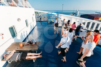 TALLINN, ESTONIA - JULY 26, 2014: Ferry boat departs from port in Tallinn. People sleeping in the ferry as they waiting for arrival
