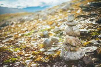 Stack Of Rocks Stones On Norwegian Mountain, Norway Nature. Toned Instant Photo