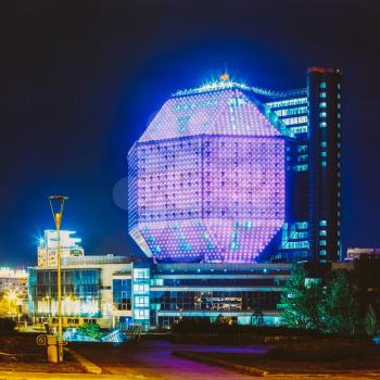 Unique Building Of National Library Of Belarus In Minsk At Night Scene. Building Has 23 Floors And Is 72-metre High. Library can seat about 2,000 readers and features a 500-seat conference hall. Toned