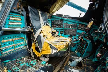 Close-up of some instruments in a helicopter cockpit in Mi-24. The Mil Mi-24 is a large helicopter gunship and attack helicopter and low-capacity troop transport with room for eight passengers.