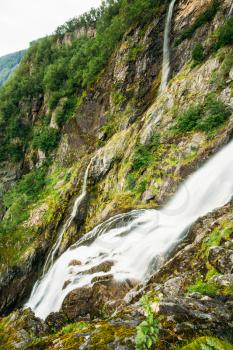 Beautiful waterfall in Norway. Amazing Norwegian nature landscape.
